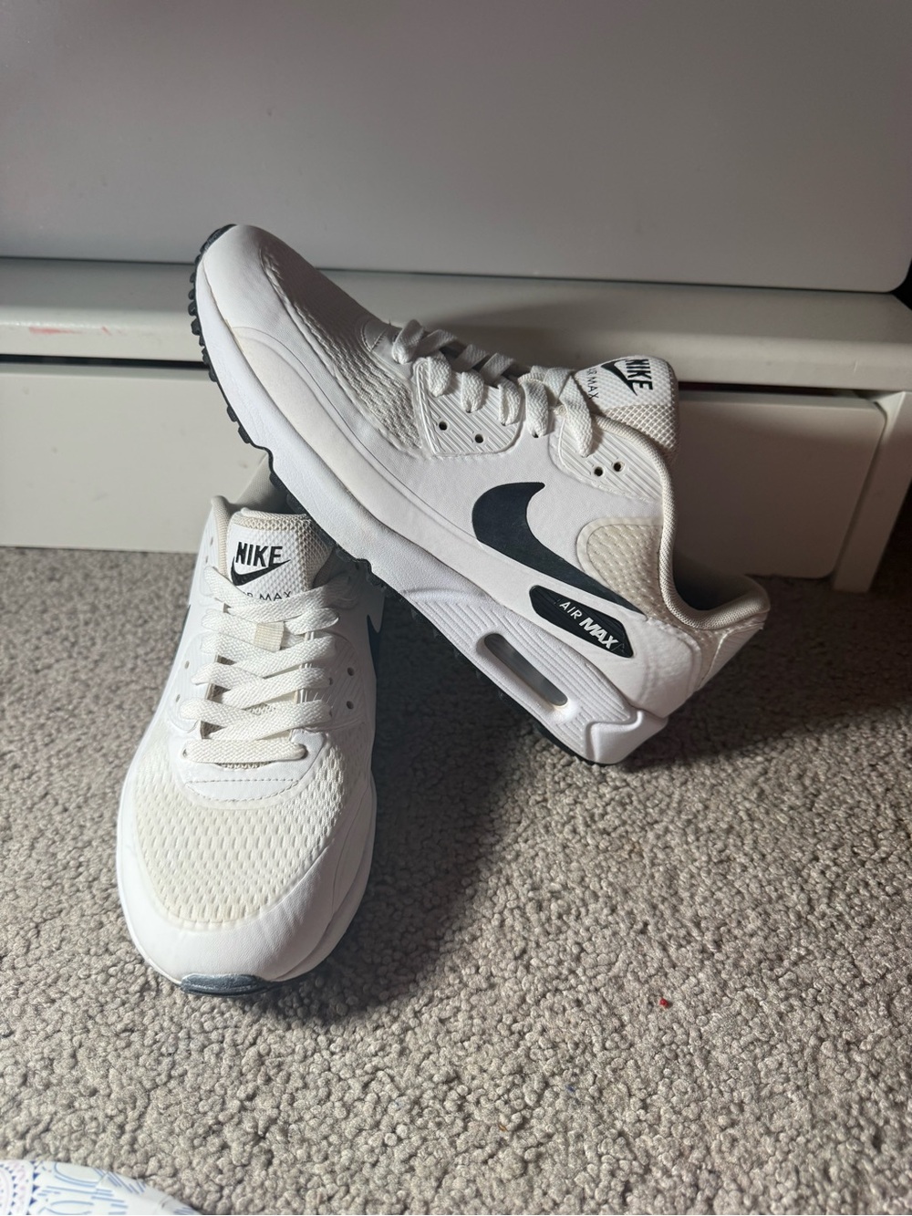 Nike Kids White Sneakers with Black Swoosh
